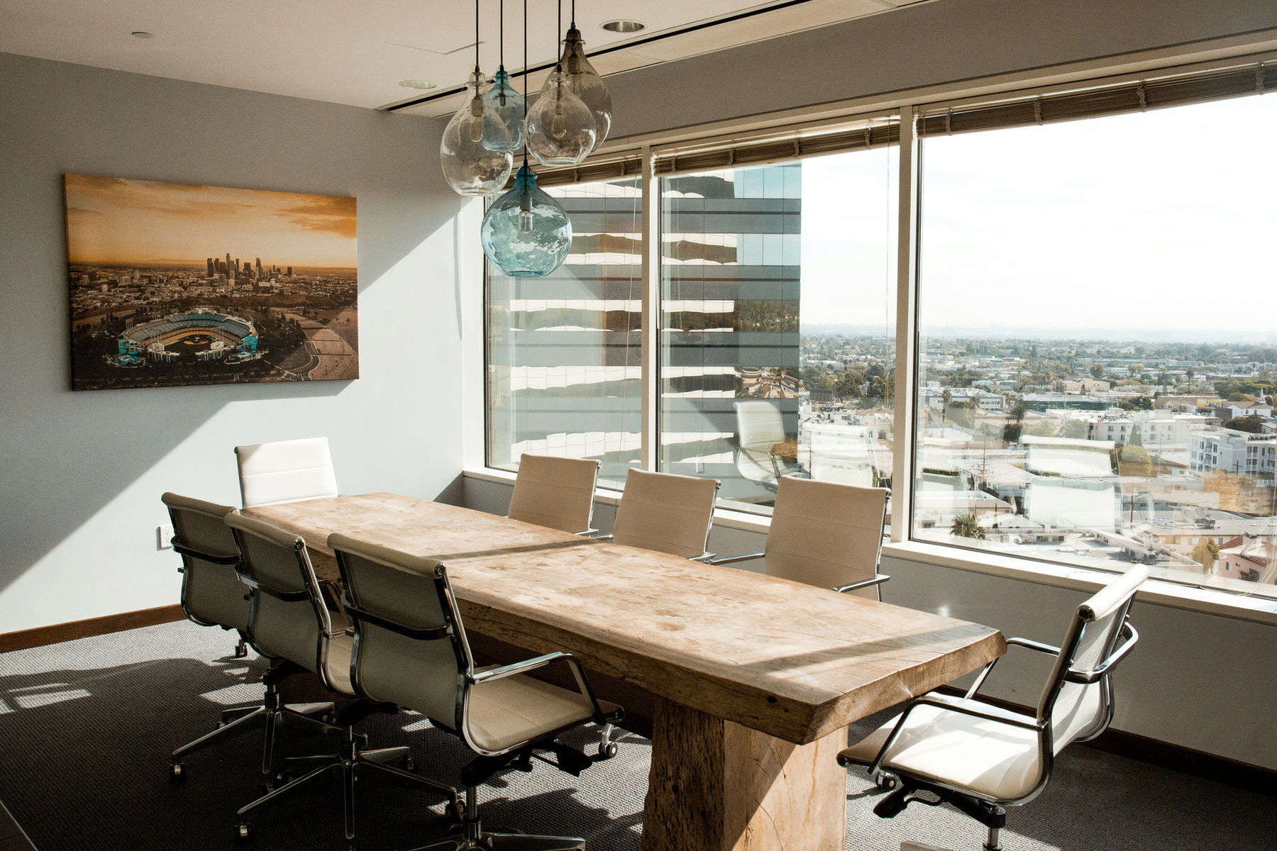 Executive boardroom overlooking a city skyline